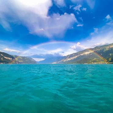 Regenbogen über dem Thunersee fotografiert von Simon Schuhmacher