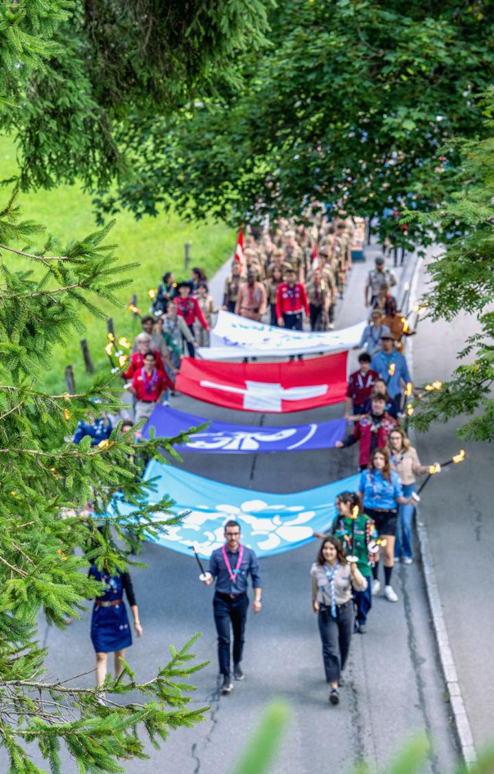 Almost 2000 Scouts marched into the center of Kandersteg on the eve of the Swiss National Day, during the later evening of the 31st of July 2025.